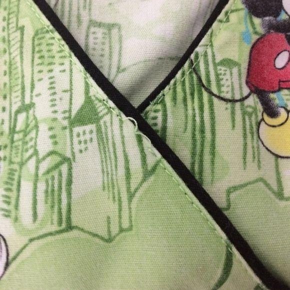 4/$25 Disney Mickey Mouse Scrub Top Cityscape Green Women's Small - Picture 8 of 8